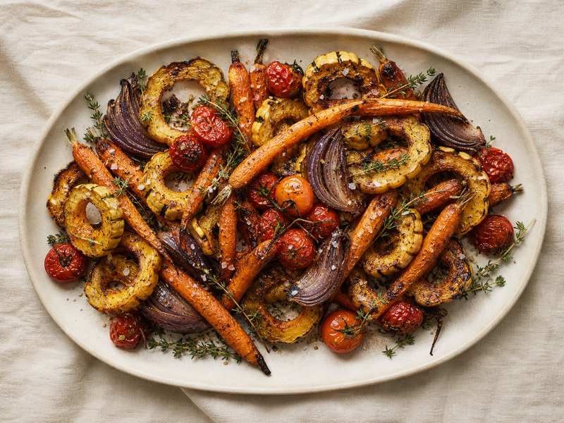 Roasted seasonal vegetables on a matte serving platter